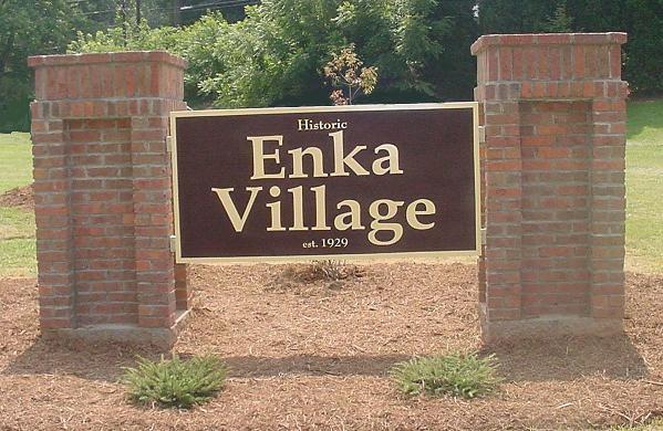 Sign for Enka Village NC where we provide roof repair and replacement