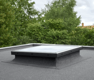 flat roof skylight cost, Asheville skylight installers, curb mounted skylight, vented skylight price, energy-efficient skylights, skylight labor costs, flat roof daylighting, roof skylight repair, cost to install skylight, Litespeed Construction Asheville, skylight installation Asheville NC, flat roof home upgrades, flat roof window cost, skylight price range 2025, roof light installation