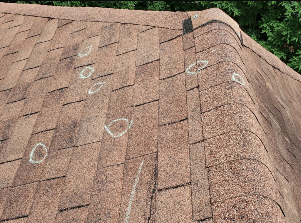 wind roof inspection, roofing insurance claim tips, storm roof damage Asheville, roofing codes NC, chalk roof markings, HAAG roofing inspection, lifted shingles inspection, roof damage symbols, Asheville roofing experts, storm damage documentation, insurance adjuster roofing, chalked shingles, wind uplift damage, roofing claim support, chalk codes Tennessee