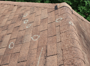 wind roof inspection, roofing insurance claim tips, storm roof damage Asheville, roofing codes NC, chalk roof markings, HAAG roofing inspection, lifted shingles inspection, roof damage symbols, Asheville roofing experts, storm damage documentation, insurance adjuster roofing, chalked shingles, wind uplift damage, roofing claim support, chalk codes Tennessee