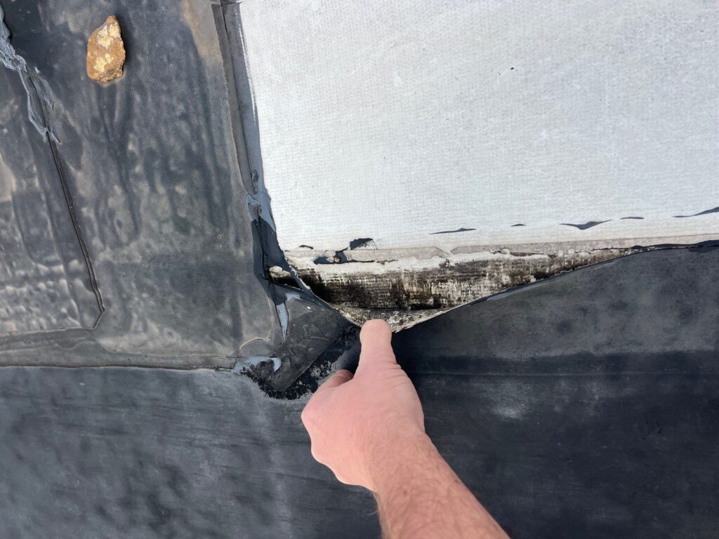 commercial roofing failure, signs of roof damage, commercial roof inspection, membrane roofing problems, roof membrane repair, commercial roof maintenance, flat roof issues, signs of membrane deterioration, EPDM roof failure, TPO membrane issues, roof water damage signs, roof leakage commercial, Knoxville roofing contractors, roofing company Knoxville TN, commercial roofing experts