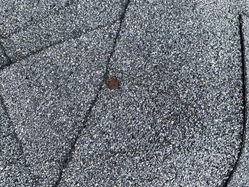 nail pops cause roof leaks, roof leaks Asheville NC, roof repair statistics, Asheville NC roofing, roof damage causes, roofing company Asheville, roof inspection Asheville, residential roofing leaks, home roof pops, nail pop repairs, roofing advice NC, roof shingle damage, water damage roof, home maintenance Asheville, roof leak prevention