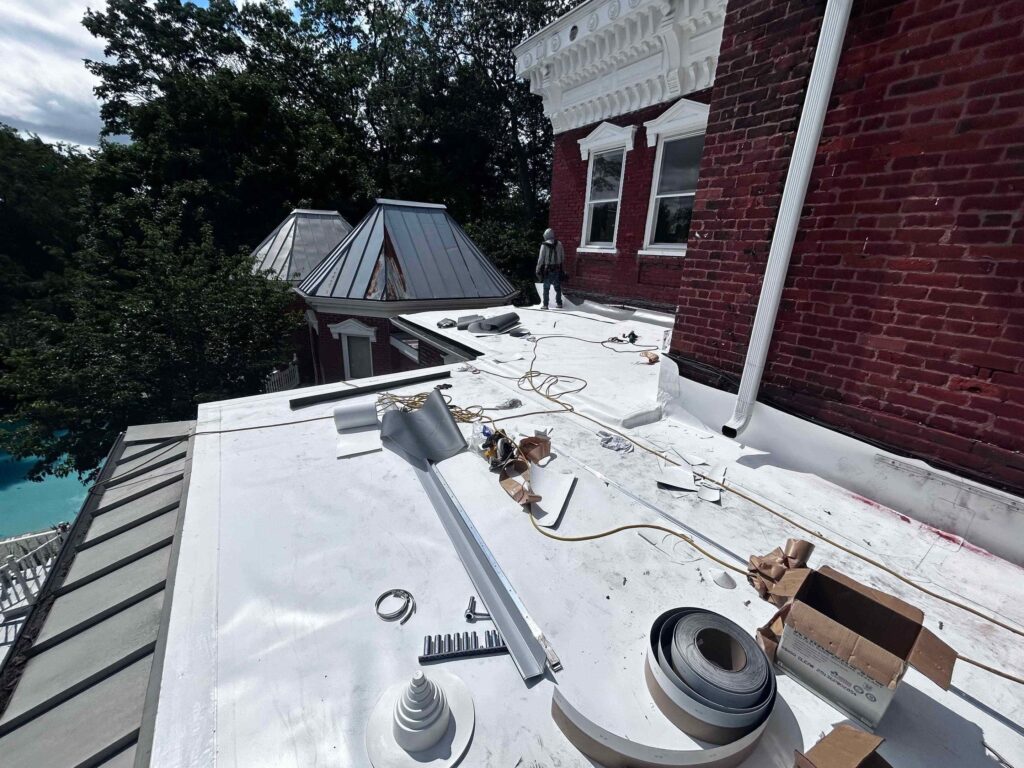 TPO Commercial Roof, TPO roof lifespan, commercial roofing Asheville, TPO roofing durability, energy-efficient roofing, Asheville roofing contractors, flat commercial roofs, TPO roofing maintenance, thermoplastic polyolefin roofing, commercial roof repair Asheville, TPO vs PVC roofing, reflective roofing membranes, TPO roof cost, commercial roof installation Asheville, TPO roof warranty, TPO commercial roof lifespan, commercial TPO roofing Asheville NC, TPO flat roof lifespan, commercial flat roof TPO longevity, thermoplastic olefin commercial roof lifespan, TPO membrane life expectancy, commercial roof replacement TPO, TPO roof maintenance tips, TPO cool roof benefits, TPO commercial roof repair Asheville, best TPO roofing system for business, TPO single-ply commercial roof life, commercial TPO roof warranty and life, how long does a TPO commercial roof last, TPO commercial roofing company Asheville