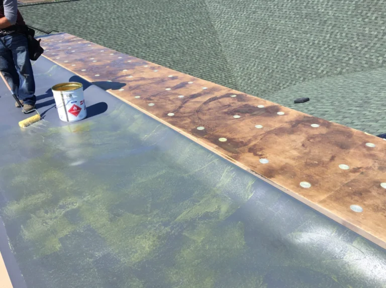 Asheville commercial roofing, roof wind damage repair, flat roof wind uplift, emergency roof repair Asheville, Buncombe County roofing contractor, commercial roof storm damage, roof membrane blow off, metal roof wind damage, TPO roof repair Asheville, EPDM roof wind damage, industrial roofing Asheville NC, roof insurance claims NC, wind uplift roofing standards, FEMA roof damage guidelines, roofing company near Asheville NC