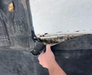 commercial roofing failure, signs of roof damage, commercial roof inspection, membrane roofing problems, roof membrane repair, commercial roof maintenance, flat roof issues, signs of membrane deterioration, EPDM roof failure, TPO membrane issues, roof water damage signs, roof leakage commercial, Knoxville roofing contractors, roofing company Knoxville TN, commercial roofing experts