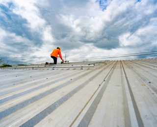 commercial roof maintenance, roof inspection tips, prevent roof leaks, extend roof lifespan, roof drainage solutions, flat roof care, best commercial roofing, roof repair guide, Asheville NC roofing, roofing contractor services, energy-efficient roofing, roof damage prevention, business roof upkeep, waterproof roofing solutions, roof maintenance schedule