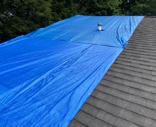 roof tarp installation, emergency roof tarp, storm damage roof repair, temporary roof cover, FEMA blue roof program, roof leak protection, Asheville roofing, Litespeed Construction, roof damage assessment, roof tarp service, roof repair Asheville, storm preparedness roofing, roof tarp cost, roof insurance claims, roof tarp lifespan